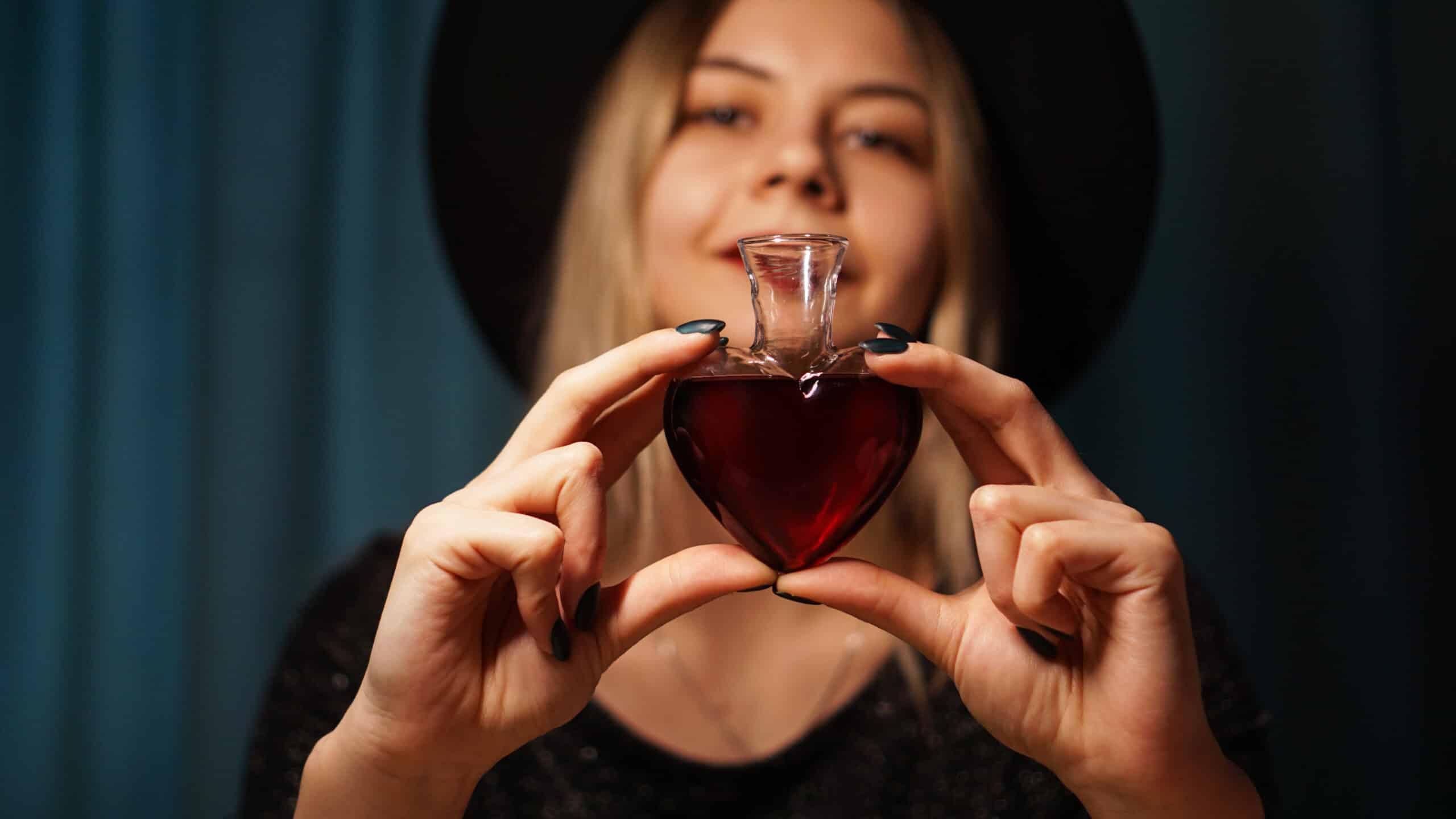 cropped image of woman holding heart shaped glass 2023 03 13 18 52 53 utc scaled
