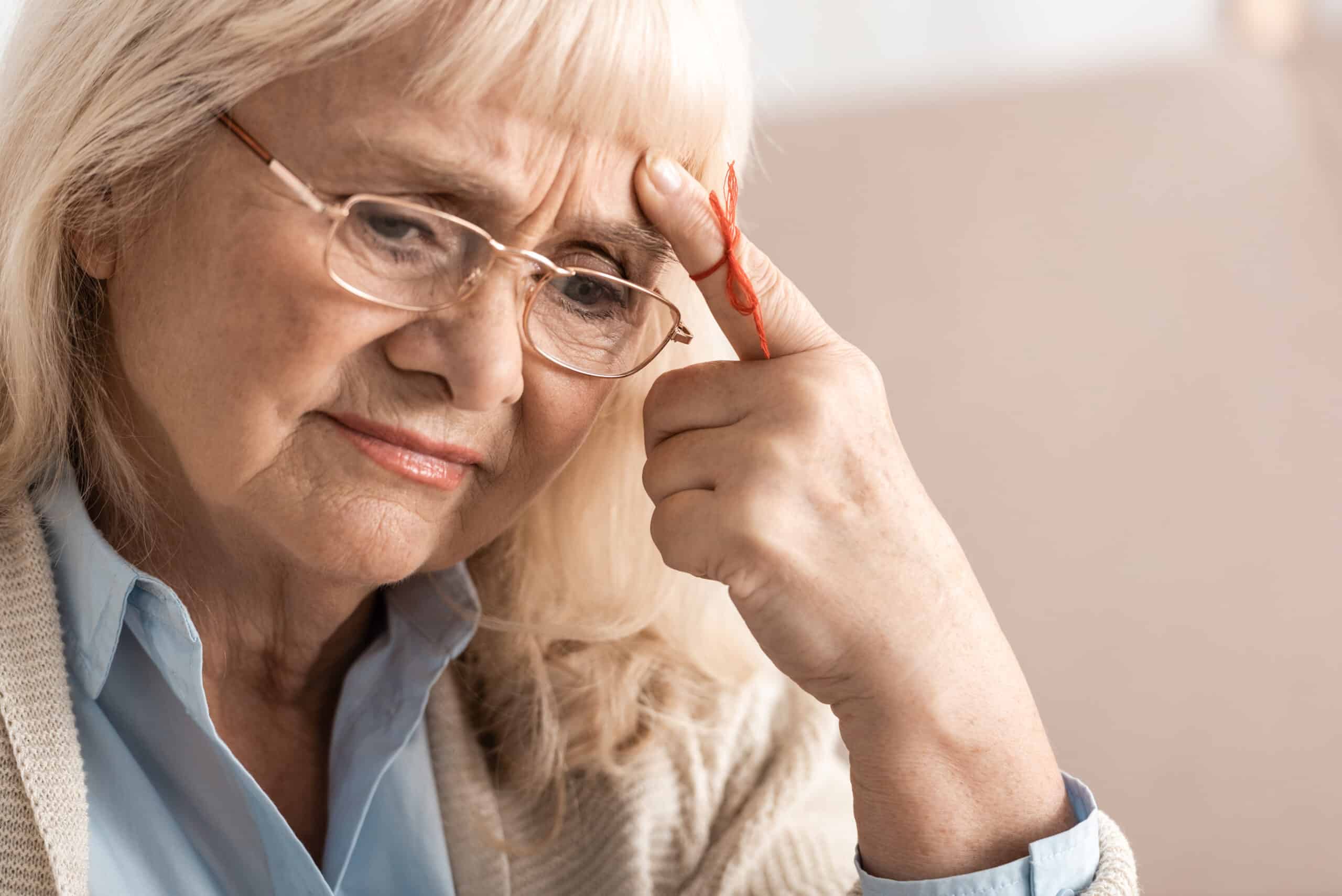 pensive senior woman with alzheimers disease strin 2022 12 16 19 10 27 utc scaled