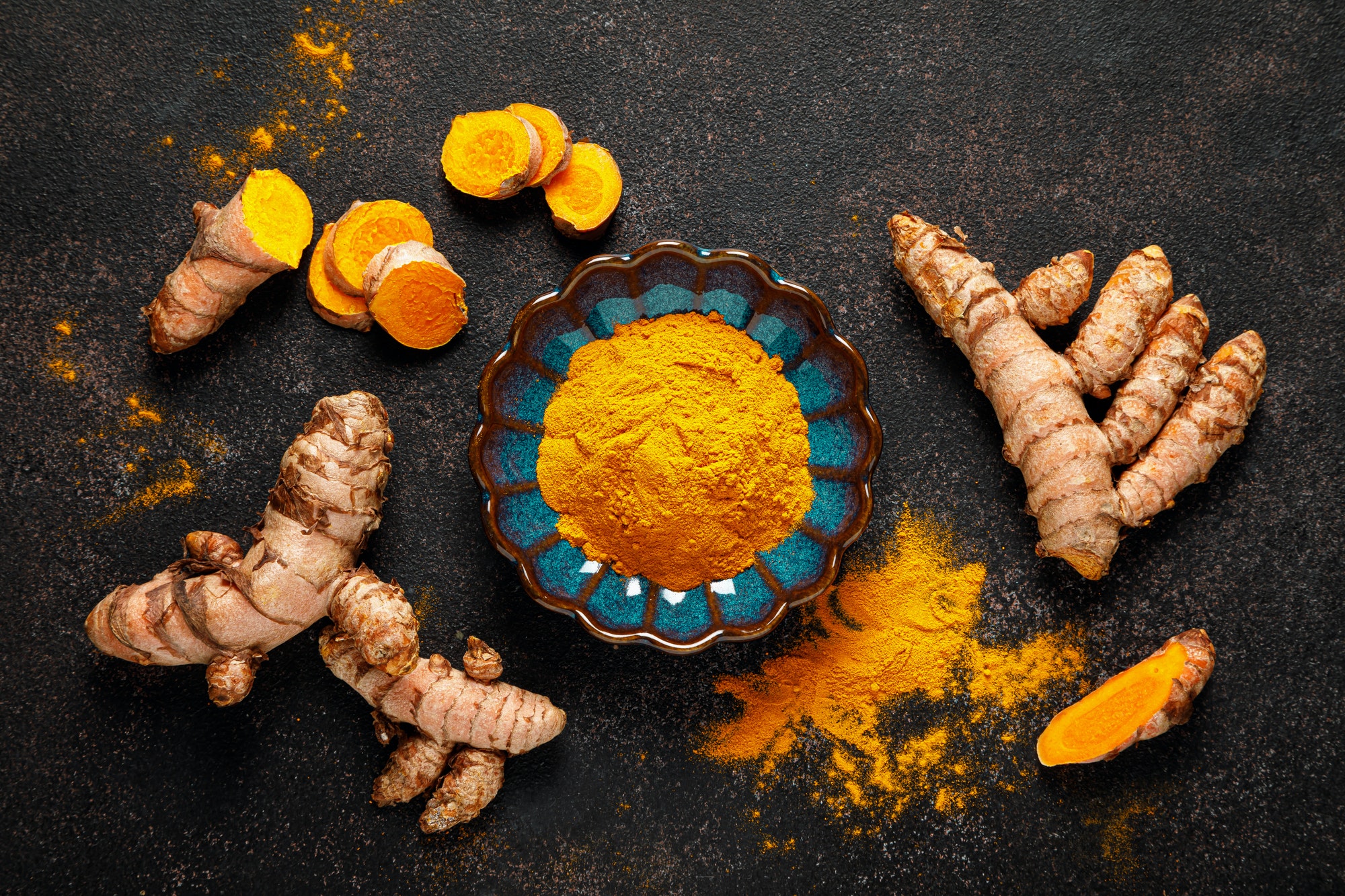 Turmeric. Fresh turmeric root and turmeric, curcumin powder