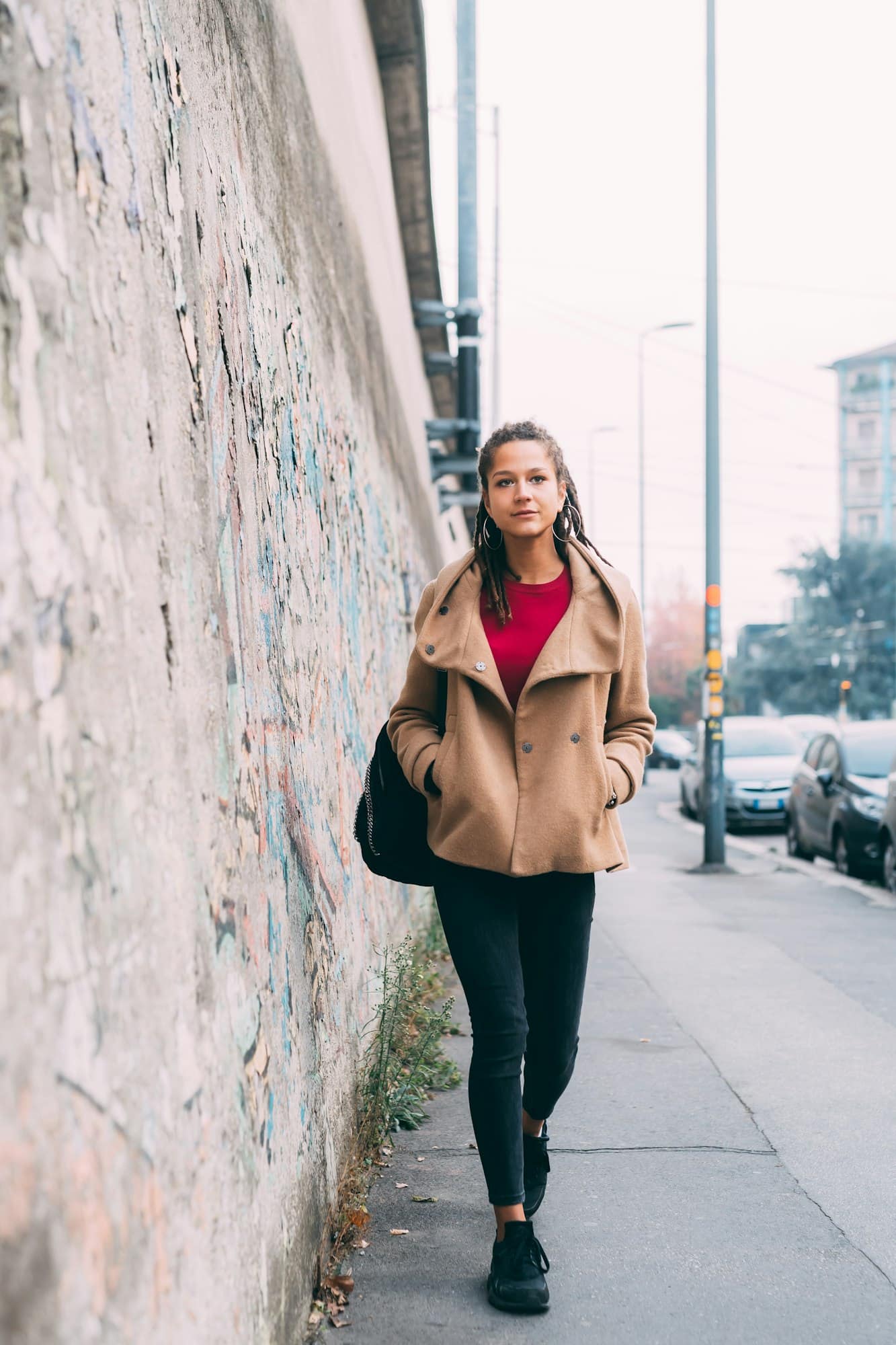 young woman walking outdoors