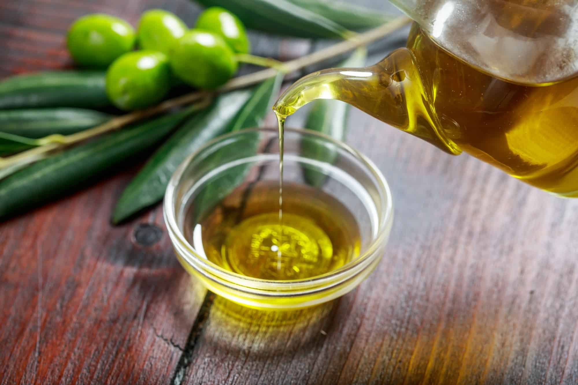 Olive oil and olive twig